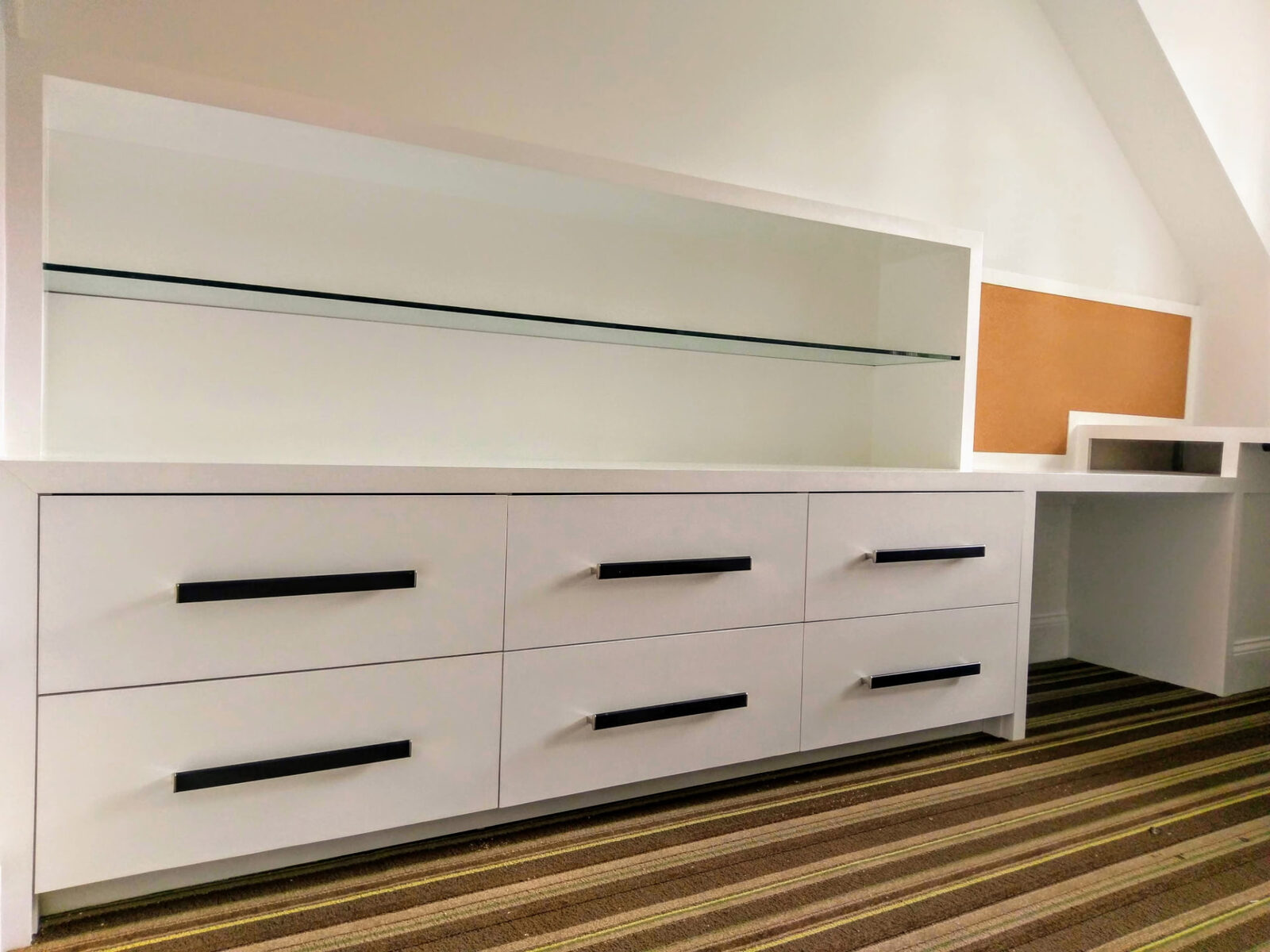 White home office built-in with drawer base, glass shelf and integrated desk in a Ridgefield, CT home