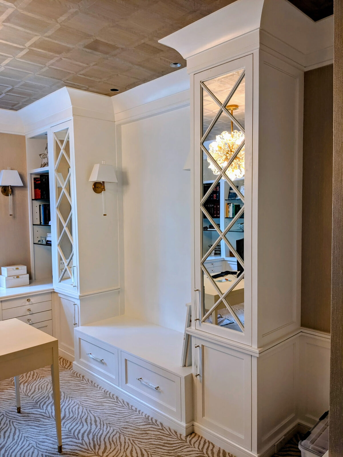 Custom white home office cabinetry with built-in storage and bench seating in Ridgefield CT